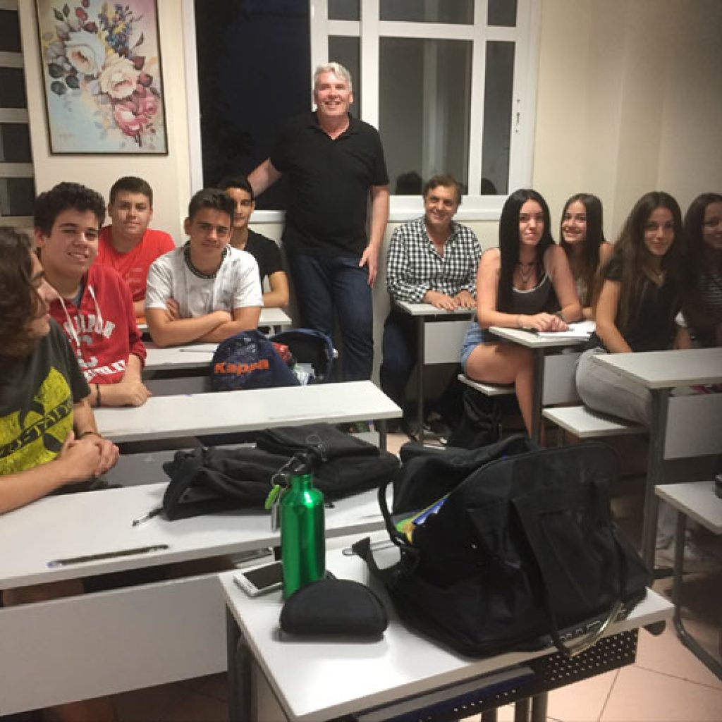 A teacher with students in an Agnes Katsianos School classroom
