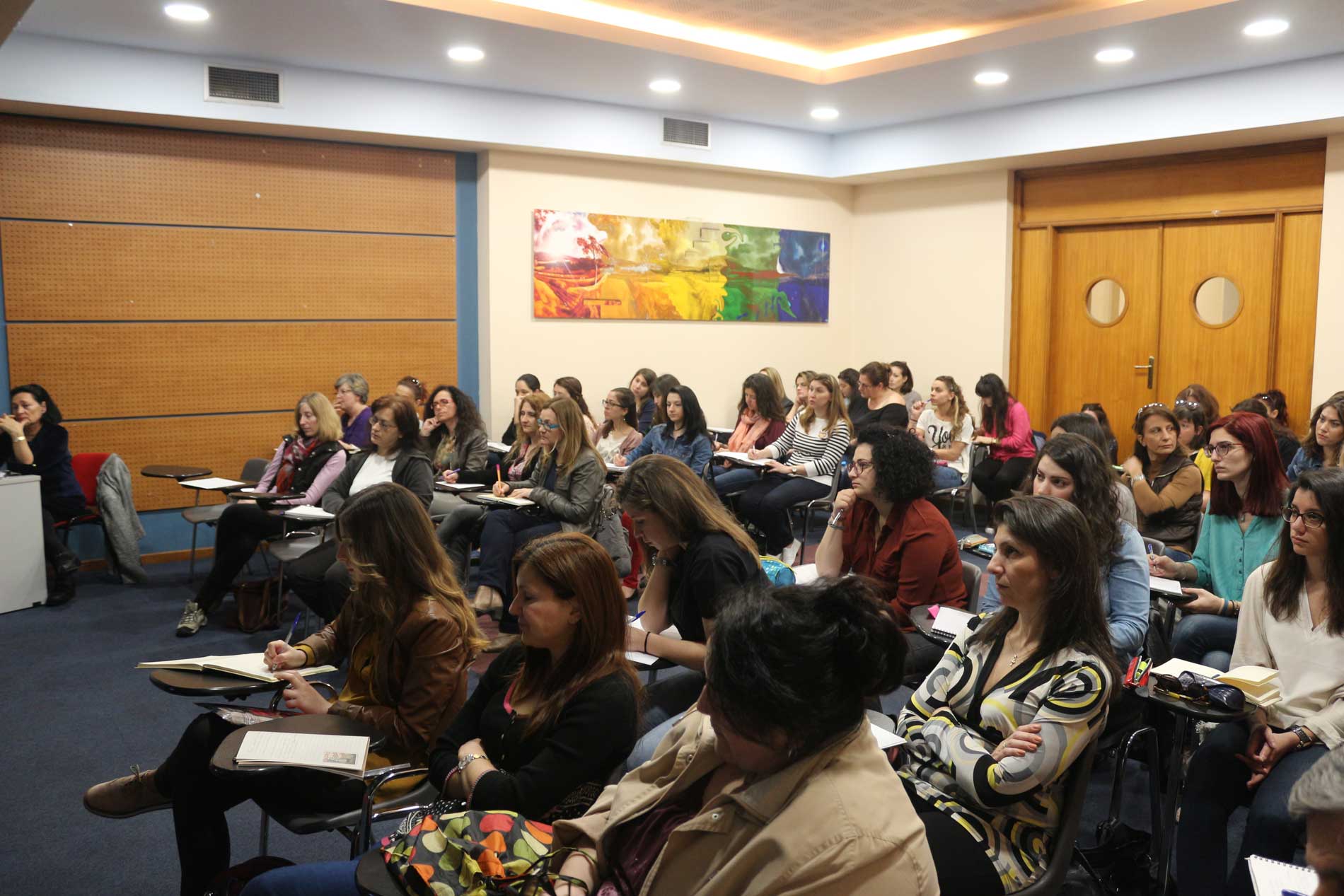 Teachers attending a professional development seminar